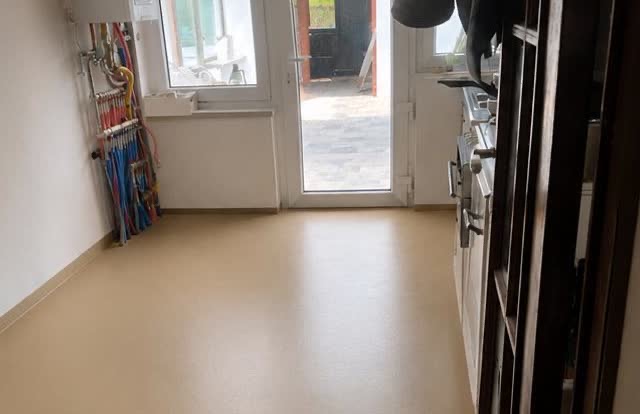 Couloir avec sol en polyuréthane sable coulé sans joint